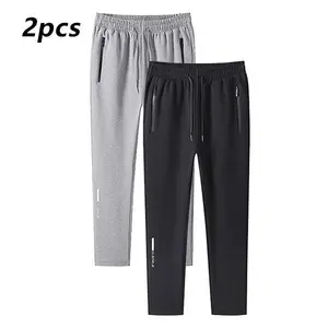 Men’s 2-piece jogger sweatpants with zippered legs and an elastic waistband; casual joggers suitable for outdoor fitness; loose fit for year-round wear; soft, comfortable pants; running pants; ideal as a gift. GARMENTARY
