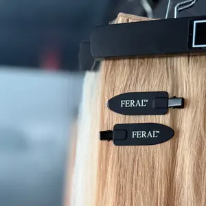 FERAL Creaseless Clips 2-Pack Matte Black Lightweight Metal Rounded Arrowhead Secure Hold for Blowouts Rollers and Makeup