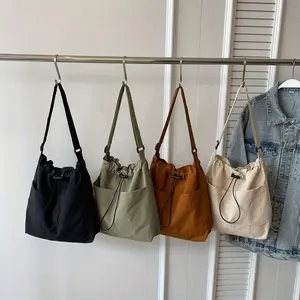 Casual fitness bag, new Korean-style casual crossbody bag, street-style simple shoulder commuter bag, bucket bag for women tote handbags luxury designer