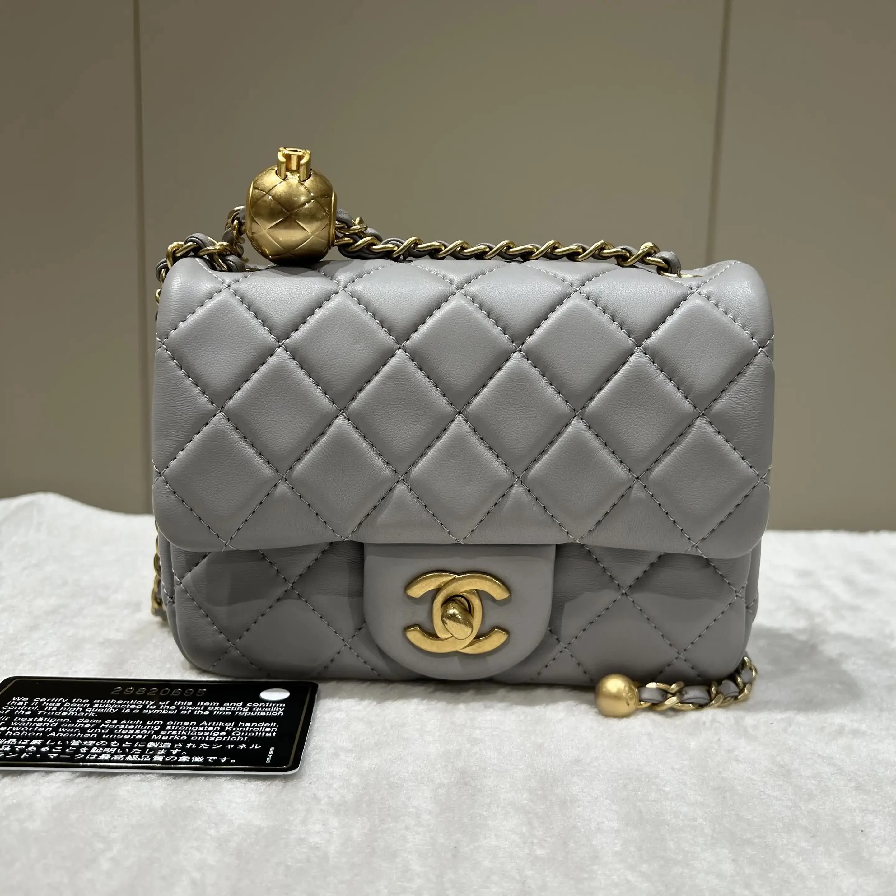 Pre-owned CHANEL LEATHER Shoulder Bags Grey & Gold Lambskin "Square Flap" Crossbody Bag with Gold Ball Charm 75378151