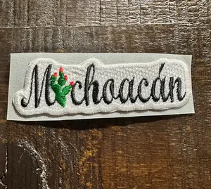 Michoacan Embroidered Hat Patch - Handcrafted Design with "Michoacán" Text and Red Flowers