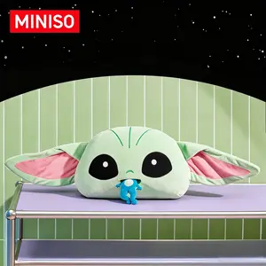 MINISO Star Wars Series No.20 Big Head Grogu Plush Pillow With Frog Design. Made Of Soft Polyester Material, This Cozy Cushion Is Lovely For Home Decor. A Wonderful Collectible And Sweet Gift Choice For Star Wars Fans And Plush Toy Lovers.