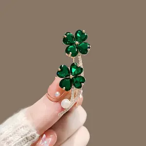 Women's green four-leaf clover brooch high-end female niche design exquisite corsage anti-exposure buckle pin suit sweater accessories