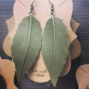 large antique brass feather earrings