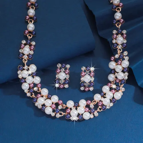 Diamond studded pearl necklace+earrings,
