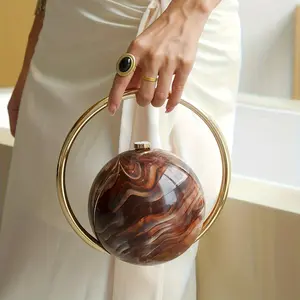Ladies' luxury handbag with globe/sphere design - elegant irregular shaped banquet handbag, smooth curved lines suitable for weddings, dances, parties, and daily wear - glossy snap closure dinner bag