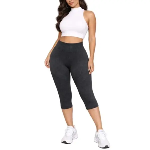 Amelia Capri Leggings - Seamless high rise waistband  Butt lifting scrunch seam detailing  Ribbed contour compression fabric  Capri length with sculpting fit  Stretchy breathable performance knit  Snatches waist and enhances curves