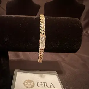6mm moissanite Cuban link bracelet in 925 silver, gold plated. 7.5in length