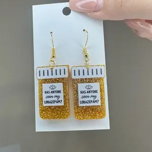 Pill bottle earrings