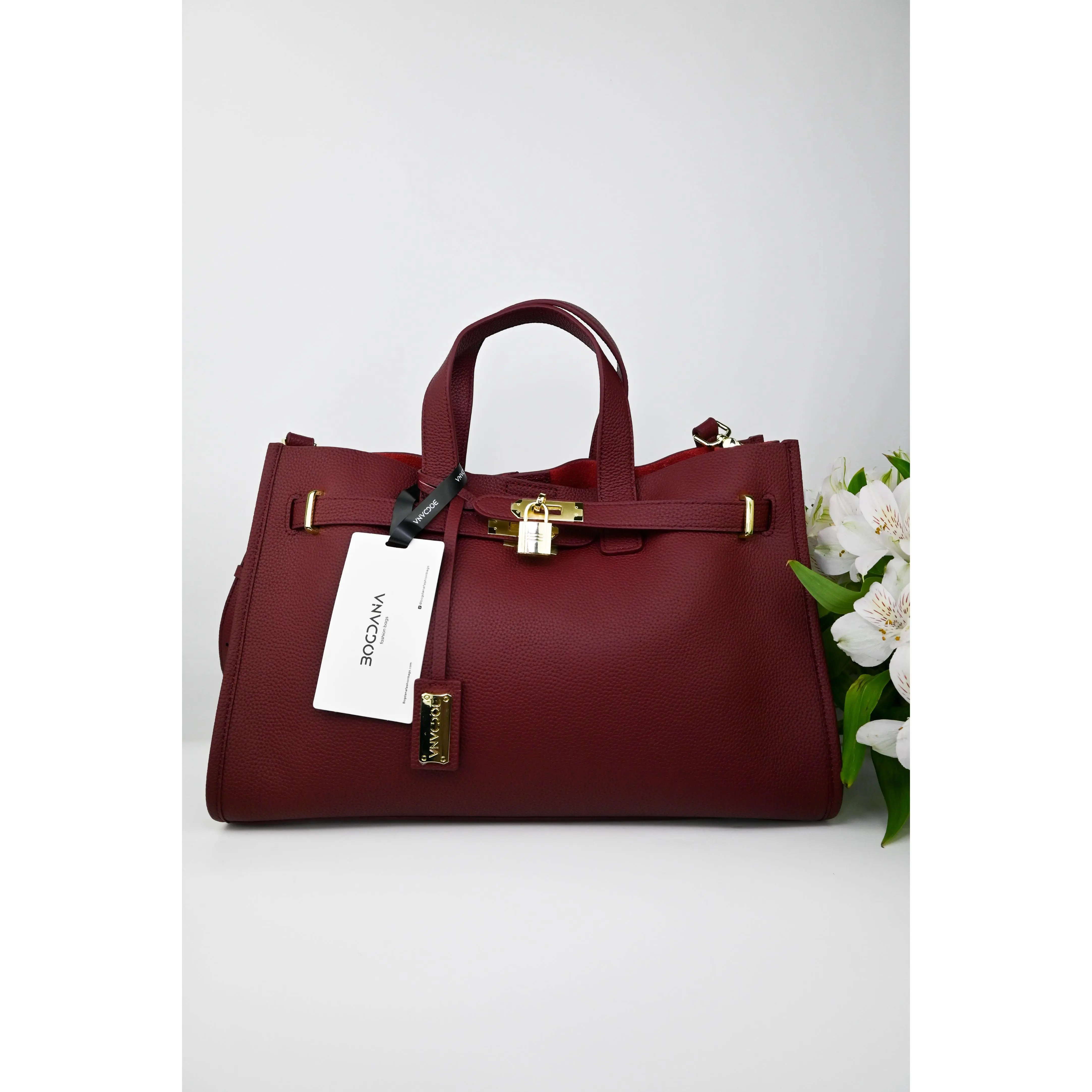 Burgundy with gold hardware.