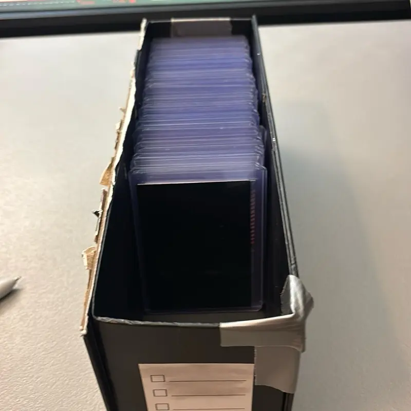 100 sleeves and top loaders