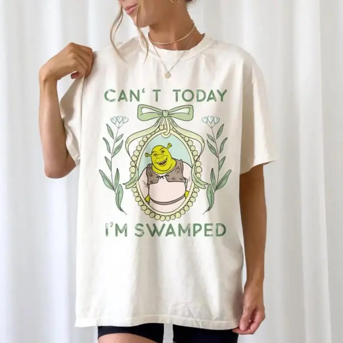 Women's Casual Cotton T-Shirt with a Coquette Style and Funny "Can't Today I'm Swamped" Shrek Meme Graphic, Fun Meme Message, Round Neck