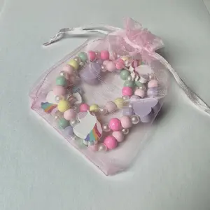 A set of cartoon bracelets and necklaces for small animals, each containing one necklace and one bracelet, unicorn, Mianyang, rainbow, candy, alpaca pattern, solid wood material