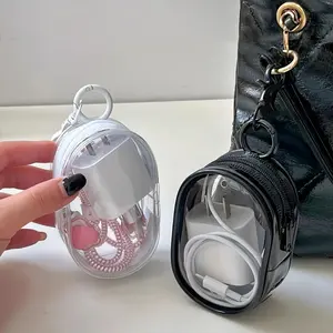 Two mini portable transparent cable storage boxes for storing data cables, chargers, earphones, jewelry, etc., and also suitable for outdoor travel keychains.