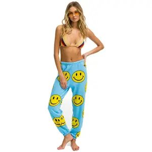 SMILEY REPEAT SWEATPANTS - SKY