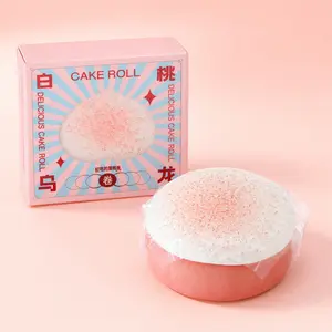 White Peach Oolong Cake Slow-Rising Squishy Toy,Cake Roll Squishy Toy, Slow Rising Soft Squeeze Stress Relief Fidget Toy, Cute Dessert Sensory Toy for Kids, Teens and Adults。