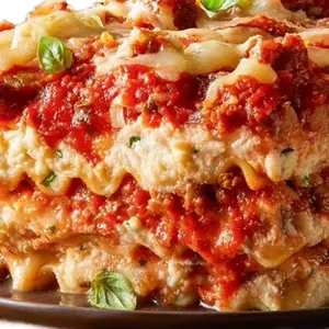 Homemade Lasagna Whole Pan $80 Half Pan $40 $20 per Slice with Ground Meat Onion Canned Tomatoes Fresh Herbs & Spices Garlic Sauce Sugar Food