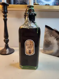 Beetle Juice Potion Bottle. Excellent Halloween or year-round decoration! Hand Tin