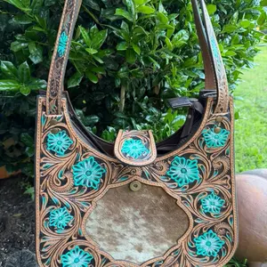 Brown leather western style purse with floral