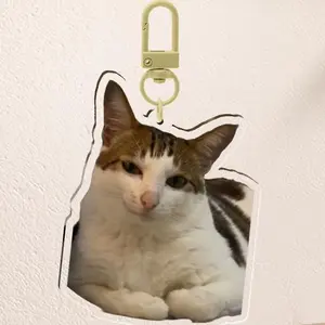 UNCLE BAO SMIRK KEYCHAIN!!