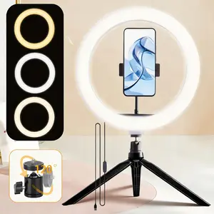 Professional 10-inch three-color ring light kit, featuring adjustable color temperature, stable tripod and mobile phone stand, suitable for video shooting, self-portrait and makeup lighting