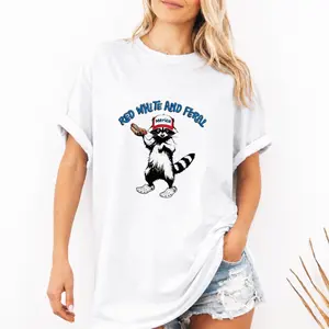 USA Red White Feral Raccoon Graphic Tee Redneck Hot Dog Party Shirt 4th of July Patriotic Funny Animal T-Shirt BBQ Outfit Gift for America Lovers Unisex Casual Vintage Style 100% cotton, made in USA.