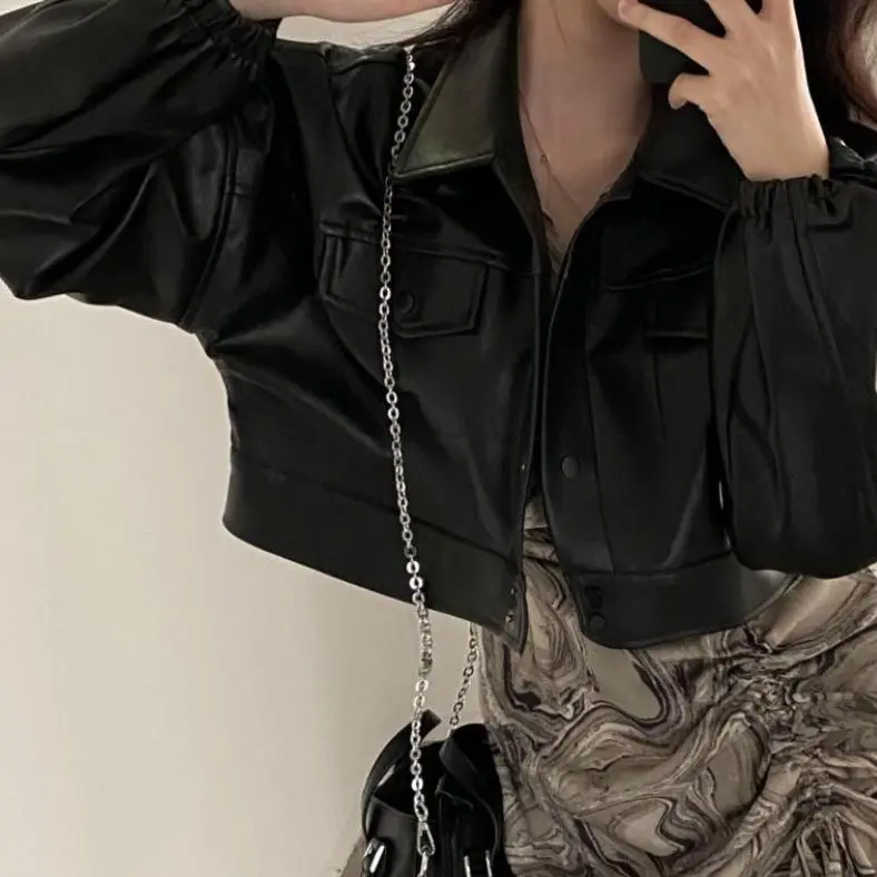 Abrigo de cuero de doble bolsillo con solapa elegante para mujeres
