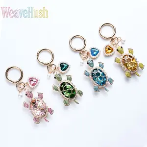 Hot Sale Pearl & Diamond Turtle Keychain, trendy ocean-themed turtle charm for women, elegant pearl and rhinestone inlaid design, stylish bag pendant decoration, perfect daily accessory and delicate holiday gift.