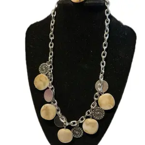 Paparazzi super cute discs and acrylic charm necklace. Medium length. Complimentary earrings.