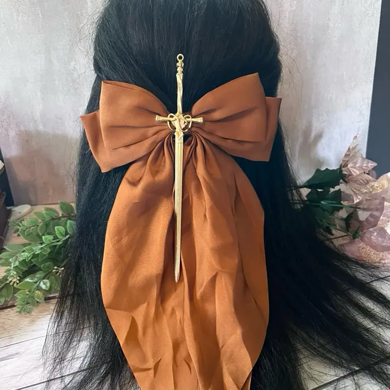 Large Hair bow with swords and axes Large Hair bow with swords and axes