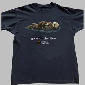 National Geographic "Go with the Flow" Baby Tee - 100% Cotton Crewneck, Durable & Comfortable, Ideal for Casual Wear, Open-End Yarn Technology, Classic Fit