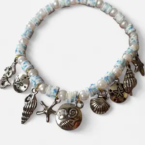 Charm of the Sea - Ocean Inspired Beaded Bracelet with Nautical Charms for Desk or Jewelry Box Decor