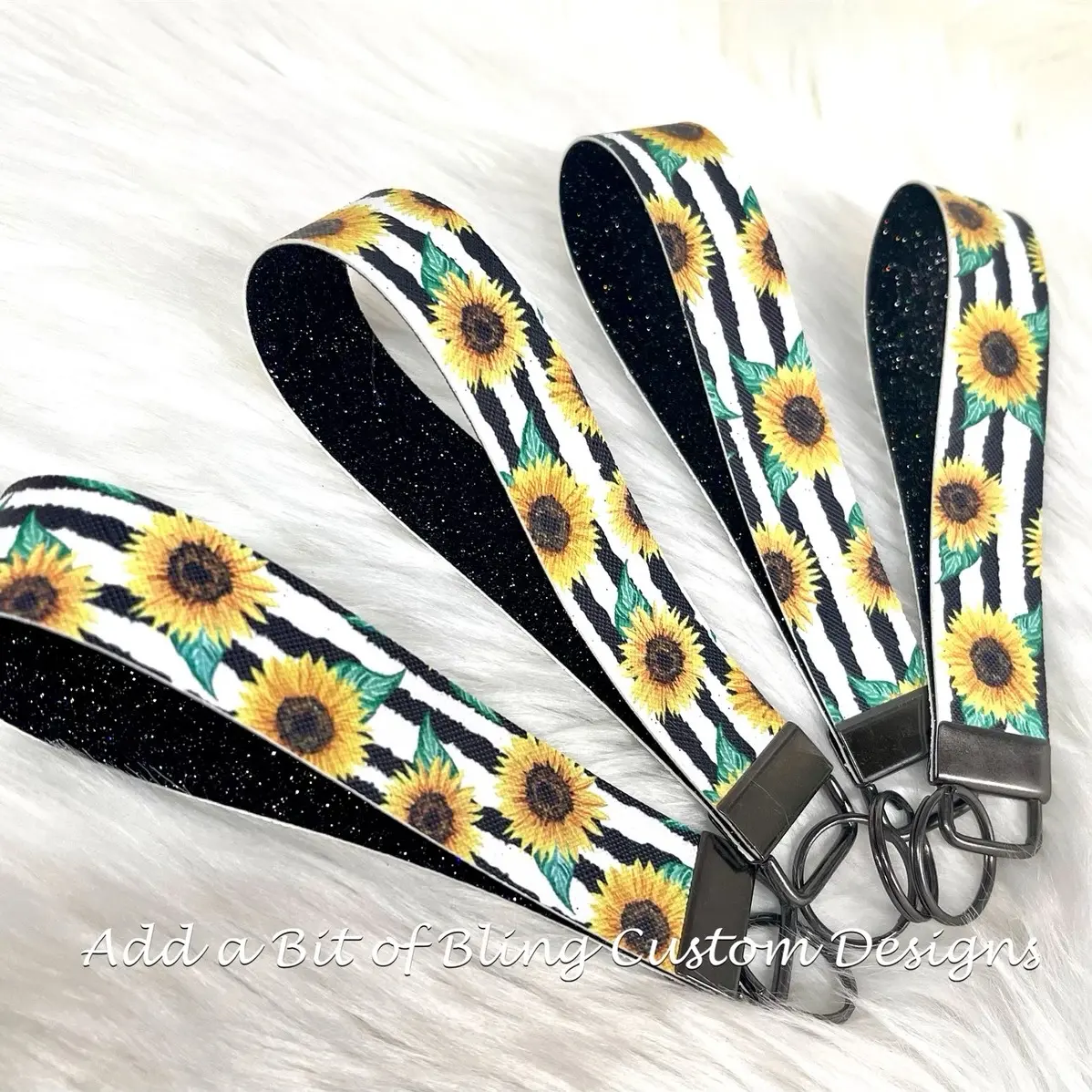 Striped sunflower glittered wristlet/keychain