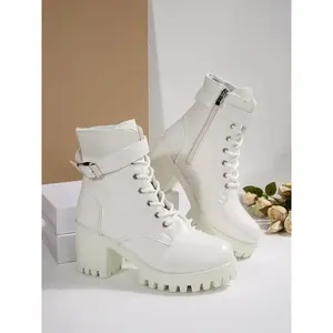 Women’s white ankle boots with buckle lace-up and zipper—stylish indoor/outdoor autumn and winter footwear; eye-catching, glamorous party and night-out shoes for festive and chic occasions; cool, easy-to-wear booties for girls.