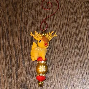 Beaded Christmas Ornament Chosen in Live Festive Reindeer Design with Snowflake Beads and Gold Accents