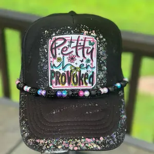 Black "Petty When Provoked" destruction Trucker Hat with Colorful Bead hat chain and hand painted Glitter Design