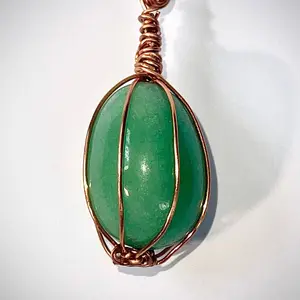 Green Aventurine Pendant wrapped in pure copper wire, on a rose gold plated copper necklace.