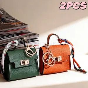 2-Piece Mini Bag Charm Set PVC waterproof material Ideal for travel, outdoor adventures, and organization Accessorize bags, car keys, lipstick, jewelry, Bluetooth earbuds, and coins