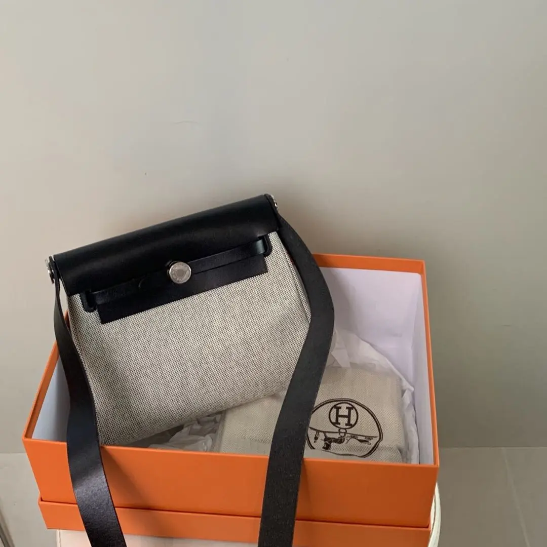 Pre-owned HERMÈS Herbag Mini Bag in Toile H Canvas Black and White Panda Calfskin Leather Bag (98% New)