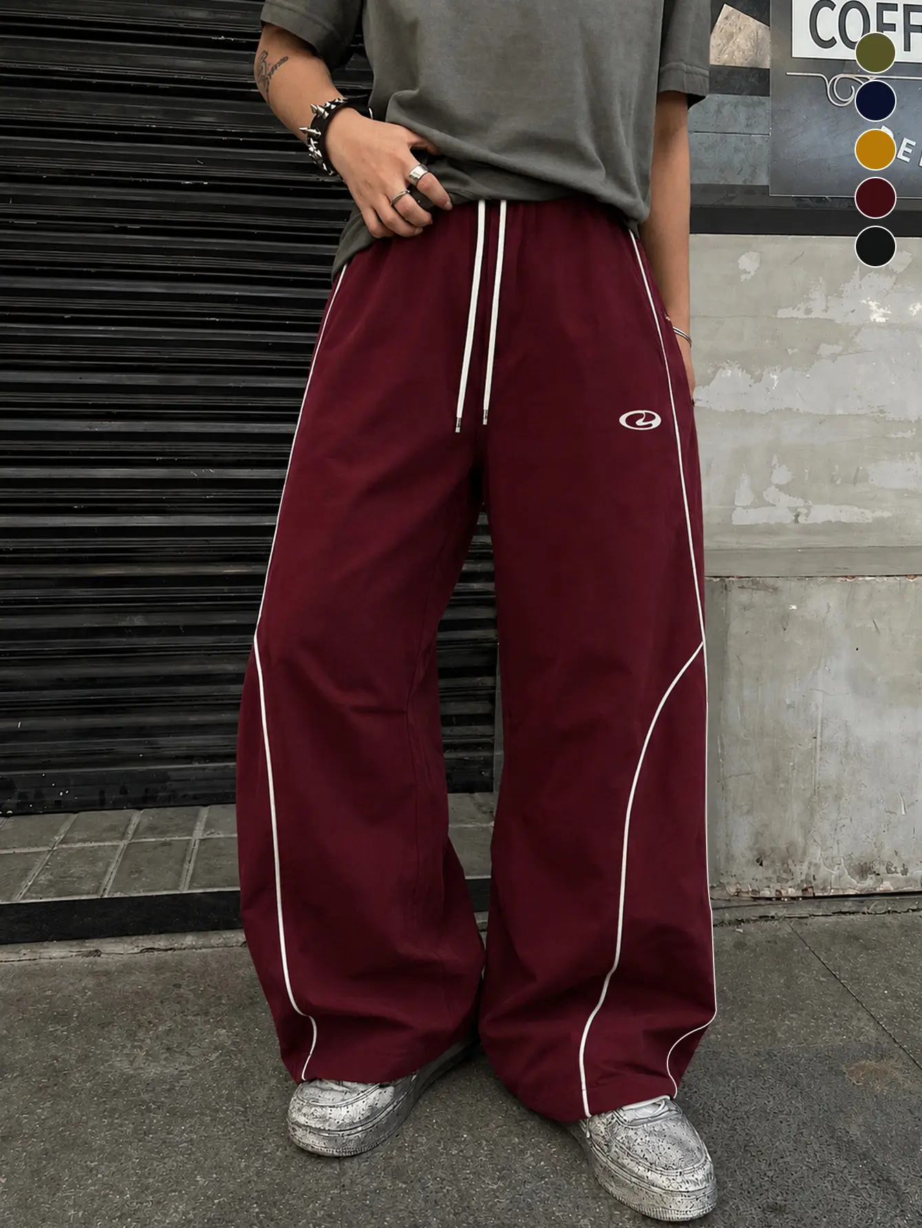 Men’s wine red wide-leg athletic pants with side stripes and drawstring, straight-cut casual long pants, trendy brand basic style, simple design, versatile for four seasons.