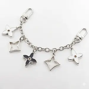 White and Black 5 Flower Star 7 Inch Bag Charm