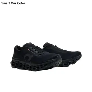 Lightweight running sneakers feature shock-absorbing hollow rugged rubber outsole, crafted from breathable woven mesh fabric, full solid black monochrome colorway, perforated upper panels, this game-changer elevates daily long-distance jogging comfort