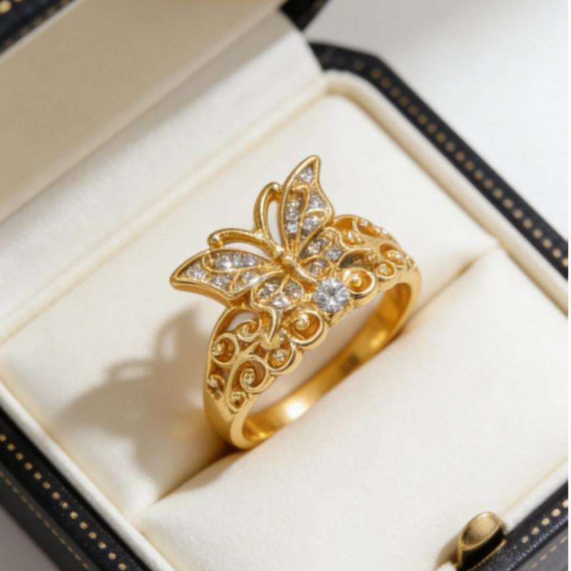 An elegant, classic 14k gold-plated ring with a butterfly design, adorned with sparkling Zirconia stones, suitable for weddings, engagements, everyday wear, gifts, and parties.