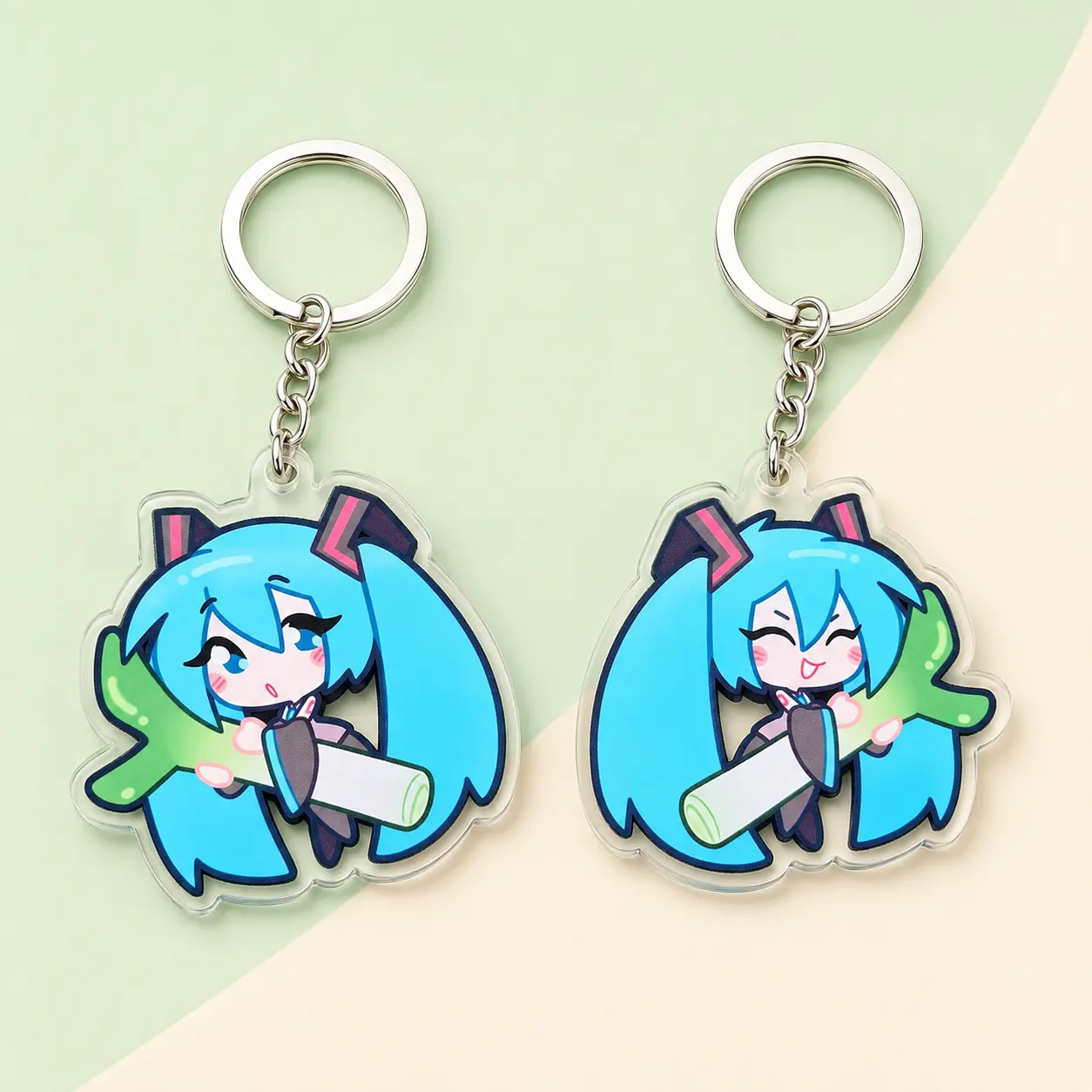 Cute Teal Hair Anime Girl Holding Green Leek Double-Sided Acrylic Keychain – Twin-Tail Chibi 2D Clear Character Charm Keyring for Bags, Backpacks, Keys & Anime Fan Gifts