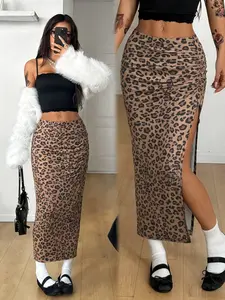 Women's Slim-Fit Side-Slit Skirt — Y2K Streetwear Style. Ldeal for Parties and Nights Out, This Trendy Retro Bottom Features a Side-Slit Design and a Stretchy, Figure-Hugging Silhouette, Making it Perfect for Both Everyday Wear and Date Nights.