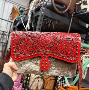 Genuine hand tooled leather & cowhide medium sized structured crossbody bag with matching tooled strap