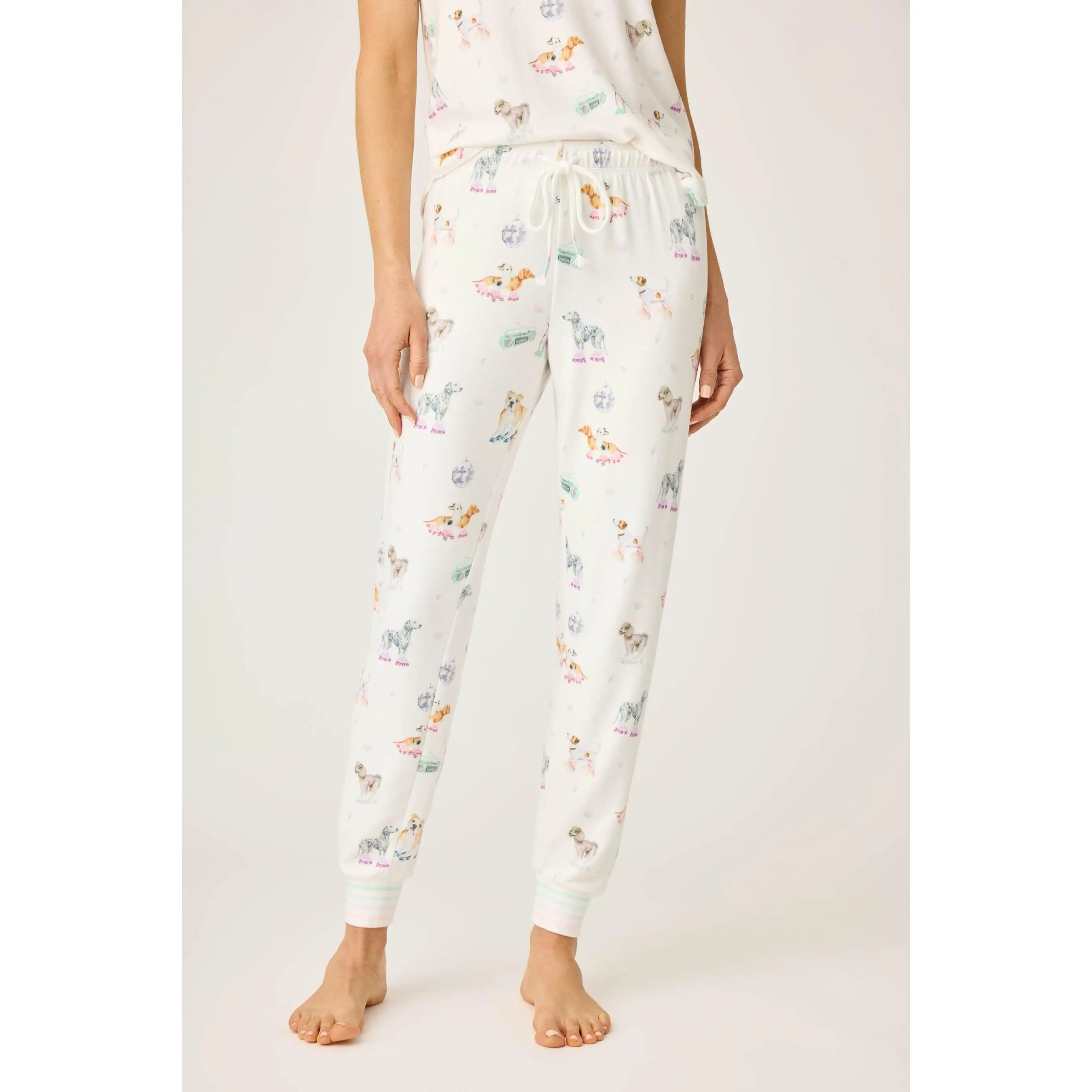 Women's Relaxed-Fit Pajama Pants in Peachy Jersey with Rollerskating Dog Print, Pastel Striped Cuffs, and Drawstring Waist, Nightwear, Stripes, Women's Clothes, Elastane, Pyjamas, Funny, Relaxed Wear, Playful Print Pants, Garment, Cartoon Style