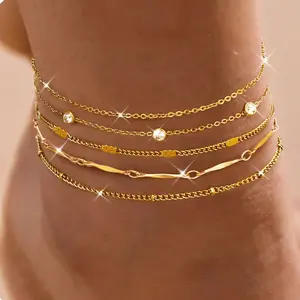CASSIECA 5pc Dianty Gold Anklets Set for Women 14k Gold Plated Stainless Steel Layered Cuban Link Herringbone Chains Adjustable 8"+2.5" Extension Summer Beach Jewelry Gift