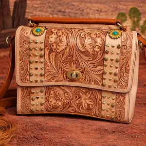 Elegant Floral Embossed Leather Handbag with Studded Details and Floral Motifs