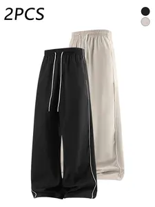 2-pack men’s casual athletic pants with side stripes, adjustable drawstring elastic waistband, loose straight-leg fit